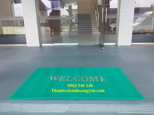 Thảm welcom màu xanh lá cây đep, bền, sang trọng.